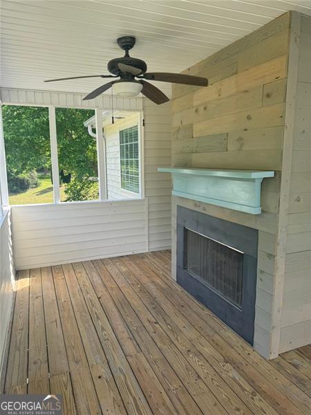955 Tributary Way, Dacula, GA 30019 - wooden terrace with a ceiling fan