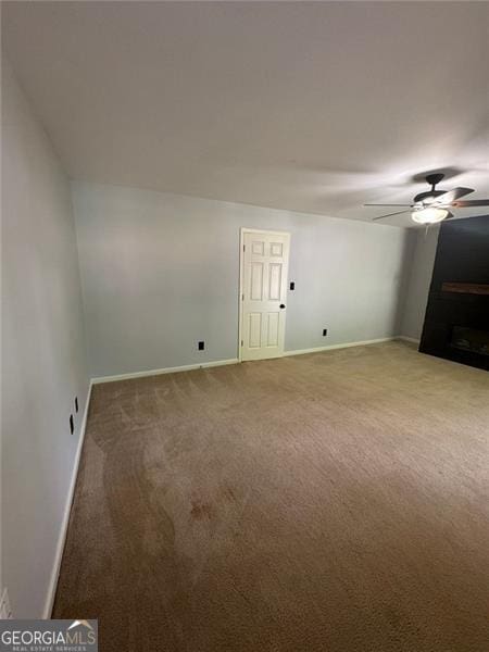 955 Tributary Way, Dacula, GA 30019 - unfurnished room with light colored carpet and a ceiling fan