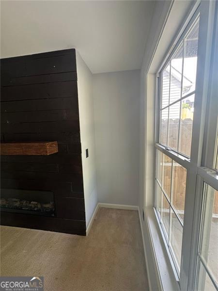 955 Tributary Way, Dacula, GA 30019 - hall featuring carpet flooring and baseboards