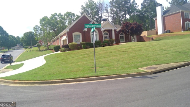 4955 Highland Lakes Dr, South Fulton, GA 30349 - view of front of home with a front yard and driveway