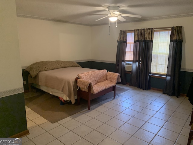 bedroom featuring light tile patterned floors and ceiling fan