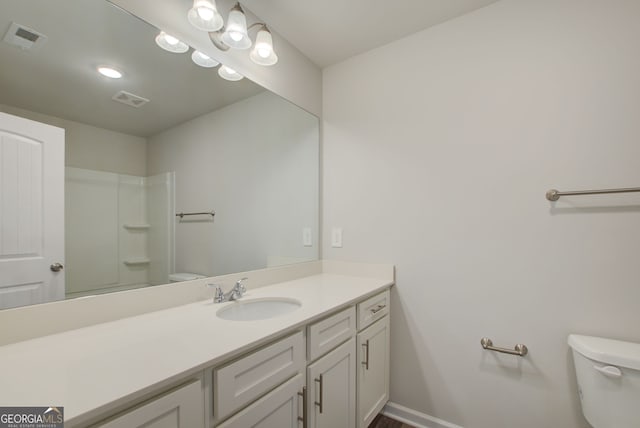 8714 Lakeview Commons Lot 48, Jonesboro, GA 30238 - bathroom featuring walk in shower, vanity, toilet, and visible vents