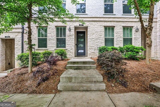 247 Franklin Rd, Atlanta, GA 30342 - view of exterior entry featuring stone siding