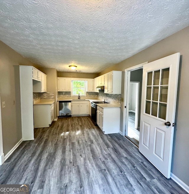 2204 Liberty Ln SW, Conyers, GA 30094 - kitchen with black range with electric cooktop, dishwasher, dark wood-type flooring, white cabinets, and a textured ceiling