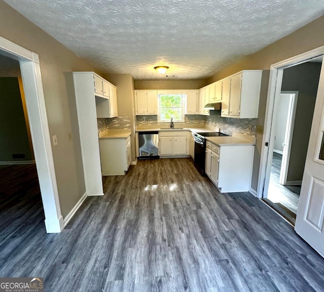 2204 Liberty Ln SW, Conyers, GA 30094 - kitchen featuring black electric range oven, stainless steel dishwasher, decorative backsplash, a textured ceiling, and dark wood finished floors