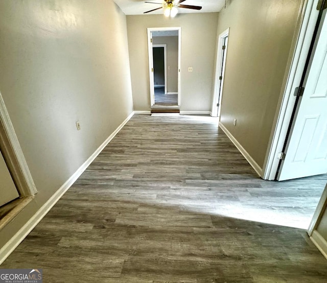 2204 Liberty Ln SW, Conyers, GA 30094 - corridor with baseboards and wood finished floors