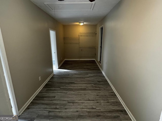 2204 Liberty Ln SW, Conyers, GA 30094 - hall featuring attic access and dark wood-style flooring