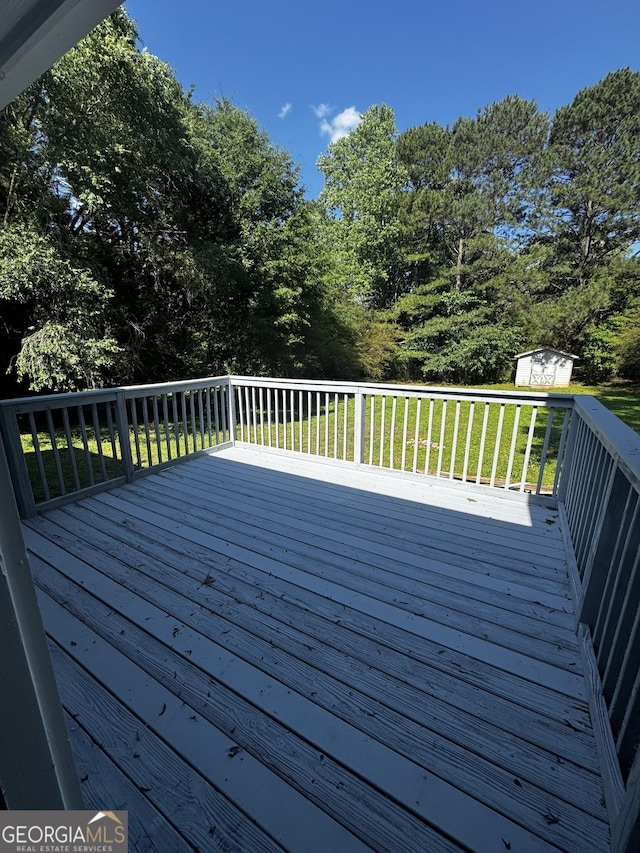 2204 Liberty Ln SW, Conyers, GA 30094 - deck featuring a lawn