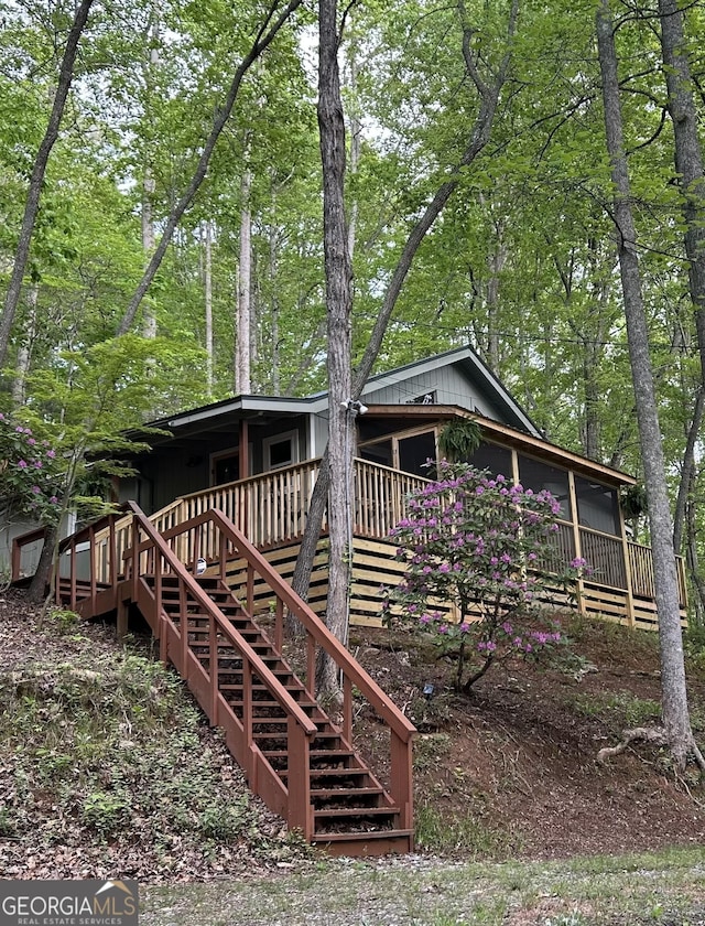 767 Robertson Cir, Blairsville, GA 30512 - view of front facade with stairs and a wooden deck