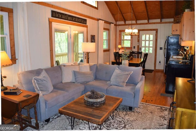 767 Robertson Cir, Blairsville, GA 30512 - living area featuring a chandelier, wood finished floors, wood ceiling, and wood walls
