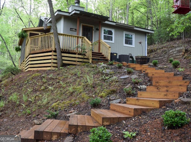 767 Robertson Cir, Blairsville, GA 30512 - view of front of house with a chimney, a wooden deck, stairway, and cooling unit