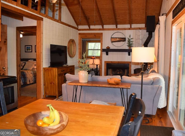 767 Robertson Cir, Blairsville, GA 30512 - dining area with wood finished floors, wood ceiling, and a fireplace