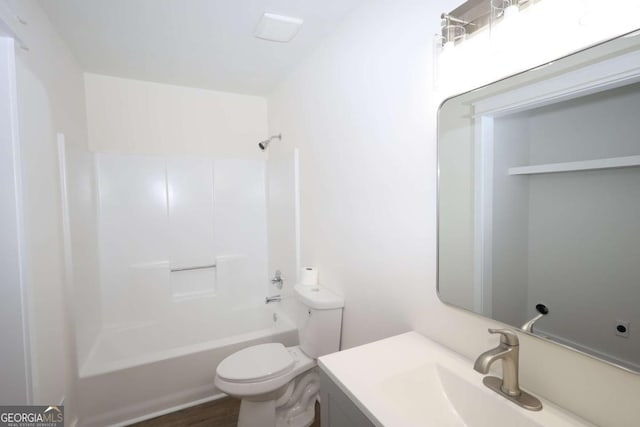 full bath featuring toilet, shower / bath combination, and vanity