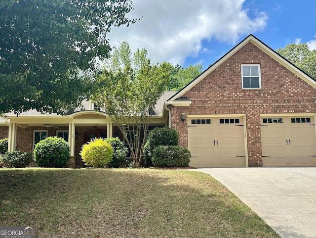 3397 Holly Glen Dr, Dacula, GA 30019 - view of front facade featuring a garage, concrete driveway, a front yard, and brick siding