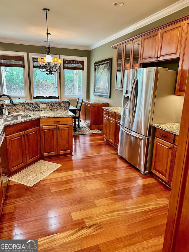 3397 Holly Glen Dr, Dacula, GA 30019 - kitchen with a sink, brown cabinets, and stainless steel fridge with ice dispenser
