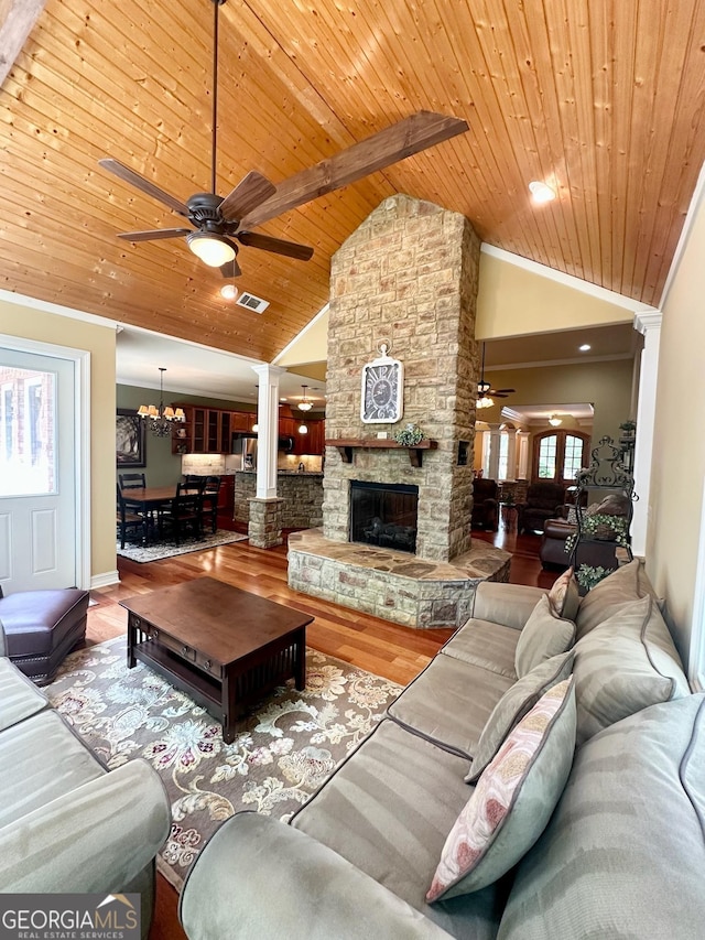 3397 Holly Glen Dr, Dacula, GA 30019 - living area featuring visible vents, wood ceiling, ceiling fan with notable chandelier, and wood finished floors