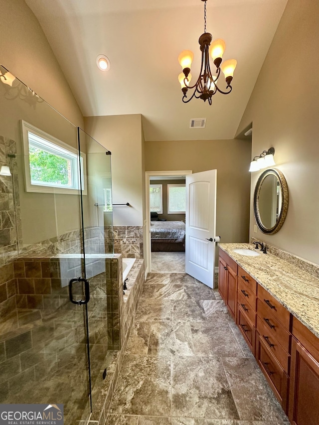 3397 Holly Glen Dr, Dacula, GA 30019 - ensuite bathroom with visible vents, lofted ceiling, a tile shower, and vanity