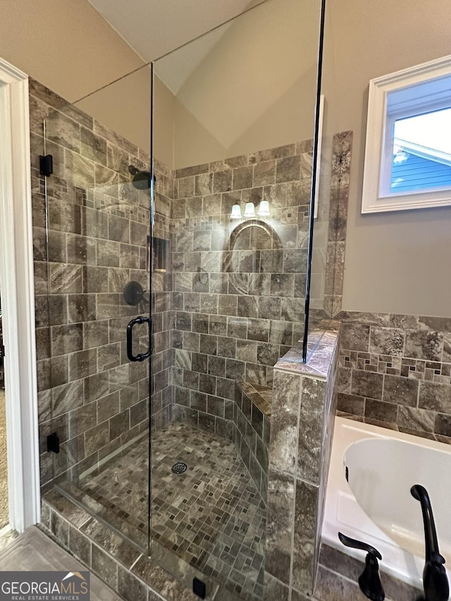 3397 Holly Glen Dr, Dacula, GA 30019 - full bath featuring a bath and a shower stall