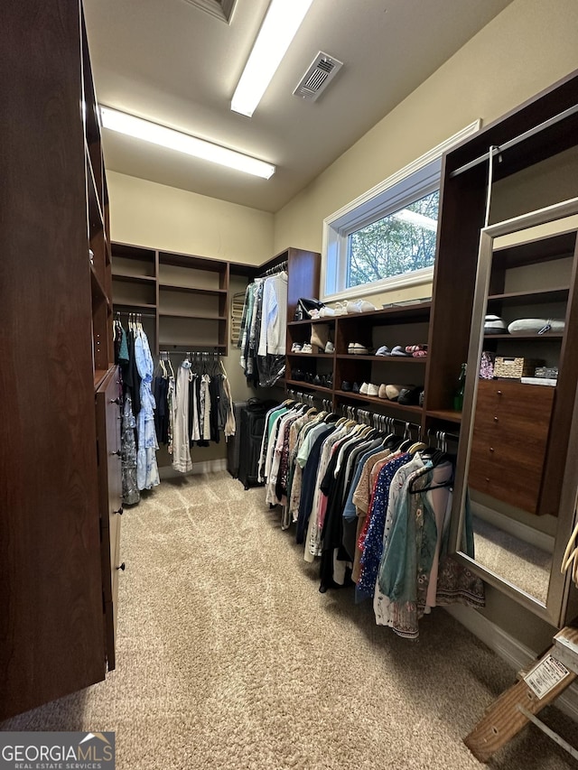 3397 Holly Glen Dr, Dacula, GA 30019 - walk in closet featuring carpet floors and visible vents