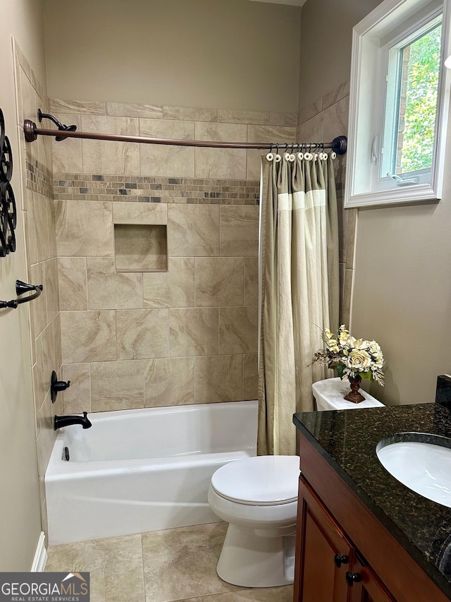 3397 Holly Glen Dr, Dacula, GA 30019 - bathroom featuring vanity, toilet, tile patterned floors, and shower / tub combo with curtain