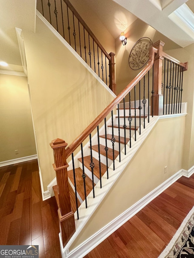 3397 Holly Glen Dr, Dacula, GA 30019 - stairway featuring baseboards and wood finished floors