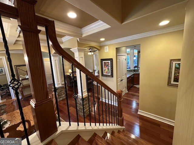 3397 Holly Glen Dr, Dacula, GA 30019 - staircase with ceiling fan, decorative columns, crown molding, hardwood / wood-style flooring, and baseboards