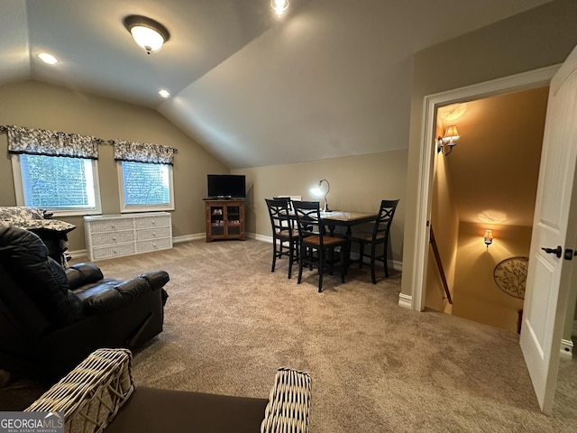 3397 Holly Glen Dr, Dacula, GA 30019 - living room featuring carpet floors, baseboards, and lofted ceiling