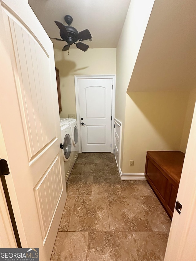 3397 Holly Glen Dr, Dacula, GA 30019 - clothes washing area featuring ceiling fan, laundry area, separate washer and dryer, baseboards, and stone finish flooring