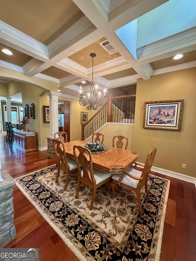 3397 Holly Glen Dr, Dacula, GA 30019 - dining room featuring visible vents, crown molding, decorative columns, arched walkways, and coffered ceiling
