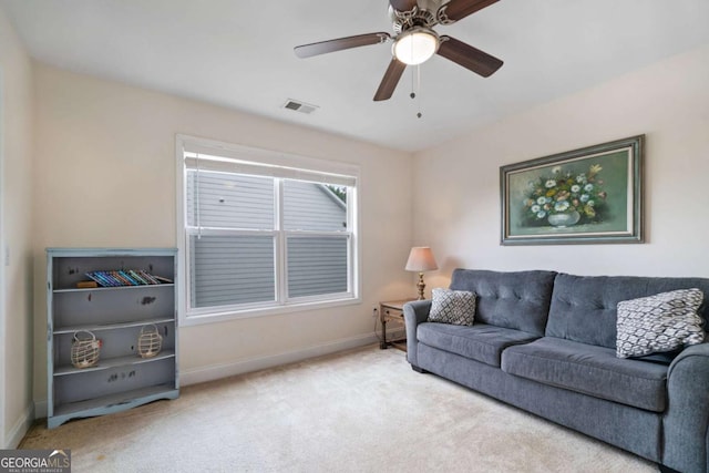 living room with baseboards, a ceiling fan, carpet flooring, and visible vents