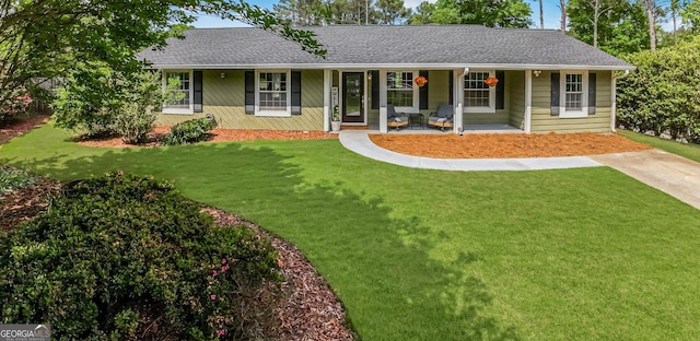 620 Clearbrook Ct, Marietta, GA 30068 - single story home with covered porch, roof with shingles, and a front lawn