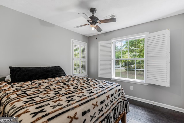 620 Clearbrook Ct, Marietta, GA 30068 - bedroom with dark wood-style flooring and a ceiling fan