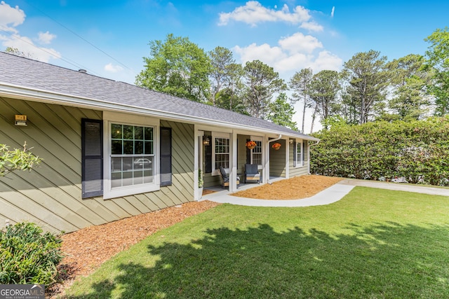 620 Clearbrook Ct, Marietta, GA 30068 - back of house featuring a lawn, a porch, and a shingled roof