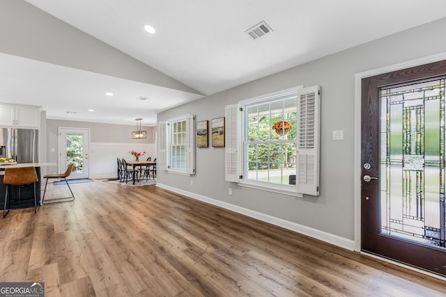 620 Clearbrook Ct, Marietta, GA 30068 - entryway featuring light wood-style floors, vaulted ceiling, and recessed lighting