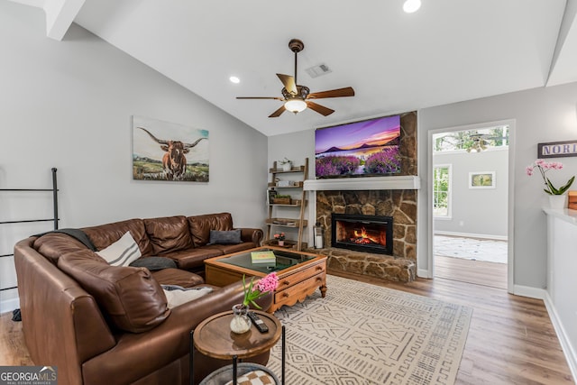 620 Clearbrook Ct, Marietta, GA 30068 - living area with light wood finished floors, lofted ceiling, a stone fireplace, a ceiling fan, and recessed lighting