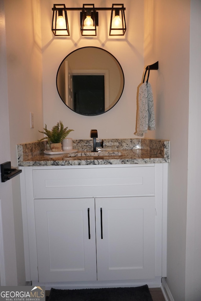 2566 Summit Cove Dr, Duluth, GA 30097 - bathroom featuring vanity and baseboards