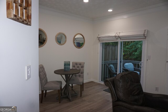 2566 Summit Cove Dr, Duluth, GA 30097 - dining room with crown molding, wood finished floors, recessed lighting, and baseboards