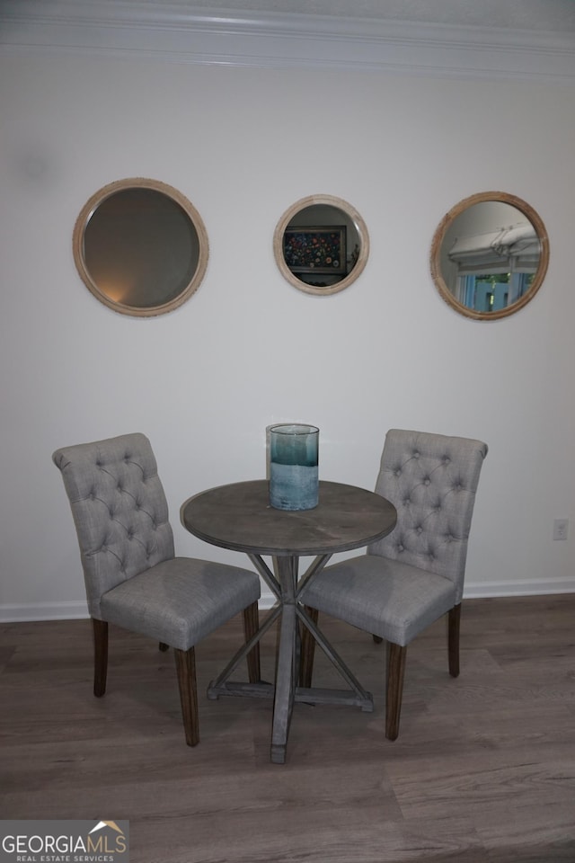 2566 Summit Cove Dr, Duluth, GA 30097 - dining room featuring baseboards, wood finished floors, and crown molding