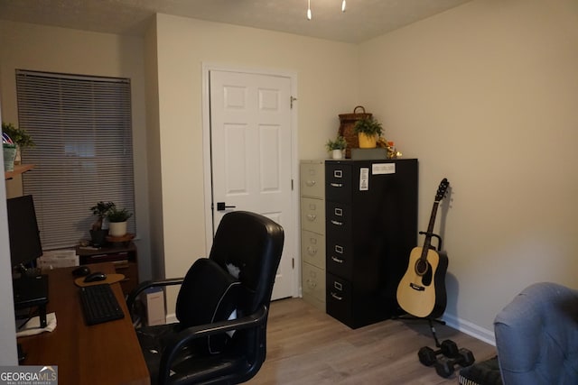 2566 Summit Cove Dr, Duluth, GA 30097 - office with light wood-style floors and baseboards