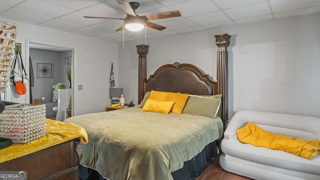 1401 Aberdeen Ct, Mcdonough, GA 30253 - bedroom featuring a ceiling fan, a paneled ceiling, and wood finished floors