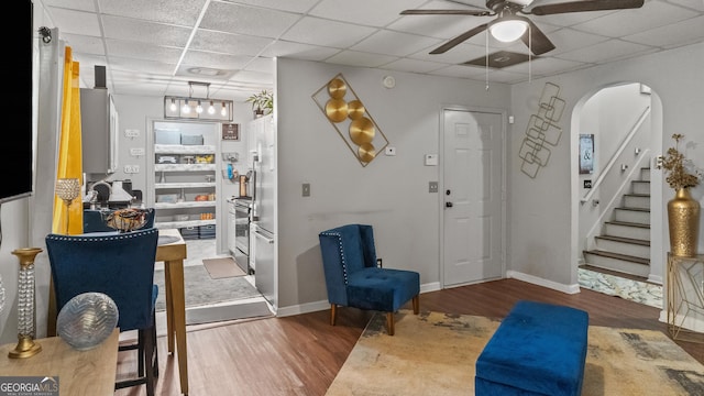 1401 Aberdeen Ct, Mcdonough, GA 30253 - entryway with arched walkways, a drop ceiling, ceiling fan, and wood finished floors