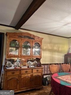 dining space with a textured ceiling