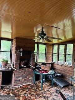 sunroom with wood ceiling