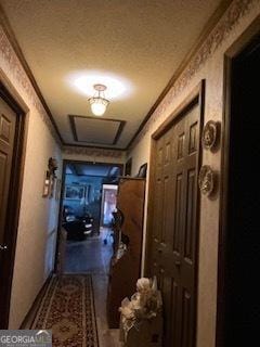 376 Paoli Rd, Carlton, GA 30627 - hallway featuring crown molding and attic access