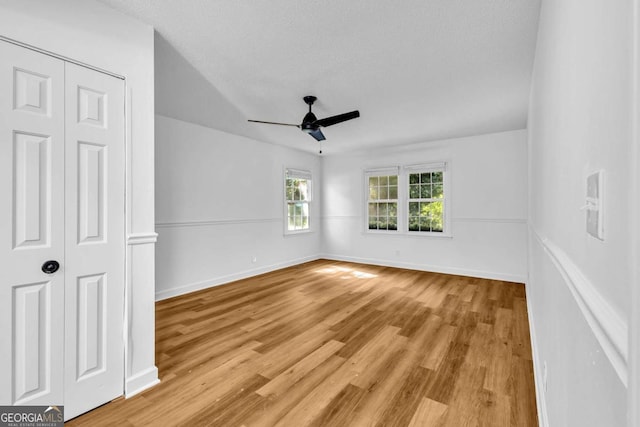 276 Greentree Pkwy, Macon, GA 31220 - unfurnished bedroom featuring baseboards, a ceiling fan, light wood finished floors, and a closet