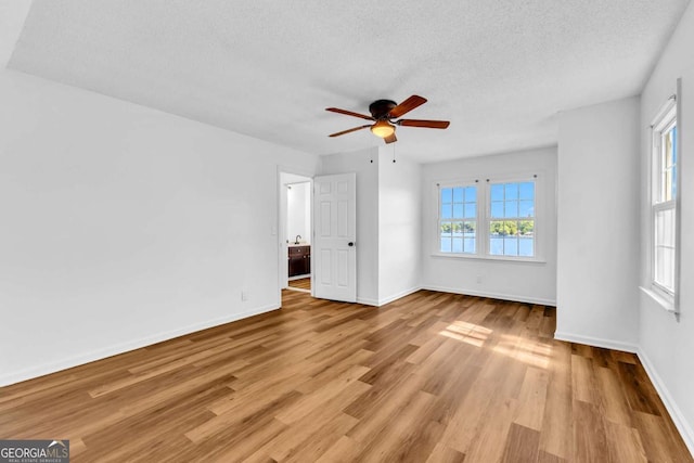 276 Greentree Pkwy, Macon, GA 31220 - spare room with baseboards, a textured ceiling, ceiling fan, and wood finished floors