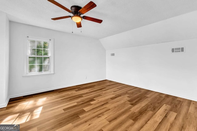 276 Greentree Pkwy, Macon, GA 31220 - empty room featuring visible vents, ceiling fan, and wood finished floors