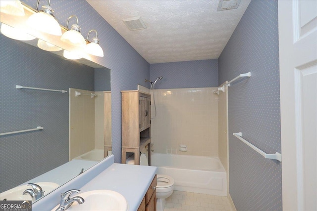 full bathroom featuring vanity, bathtub / shower combination, toilet, and visible vents