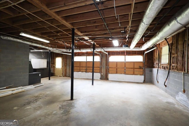 basement featuring concrete block wall