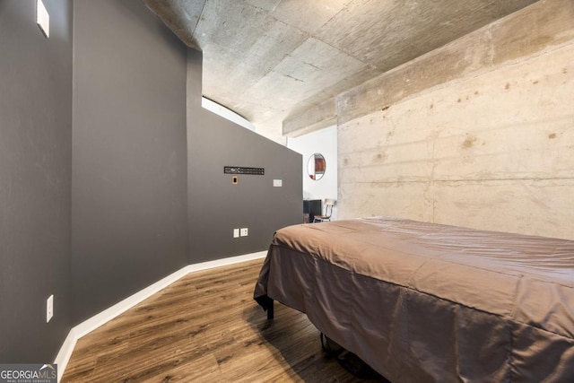 400 W Peachtree St NW Unit 3614, Atlanta, GA 30308 - bedroom featuring wood finished floors and baseboards